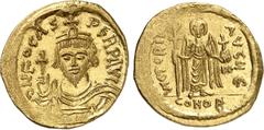 EMPIRE BYZANTIN EMPIRE BYZANTIN Phocas (607-610). Solidus, Constantinople. Av. N FOCAS - PERP AVI Buste couronné, diadémé et cuirassé de Phocas de face, tenant un globe crucigère de la main droite. Rv