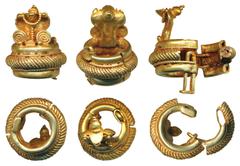 Ancient Gold ornament, 6.02g, Earring or Mukuta (a traditional Crown especially for smaller idols for home worship); depicting an open hood snake in center with ornamentation such as a necklace and sc