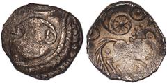 British Coins, Celtic coinage, Iceni, c.50-20 BC, uninscribed silver unit, 'Odin's eye' type, crude elongated head r., rev. wheel with 'tail' between two pellets within ring motifs above, another pell