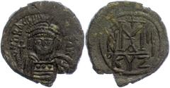 Ancient Coins Münzen Byzanz 610-613, Bronze-Follis, Heraclius, Kyzikus. Av: Büste mit Helm, Pedilienkrone, Schild und Kreuzglobus von vorn. Rev: Großes Wertzeichen "M", darüber Kreuz, daneben A/N/N/O,