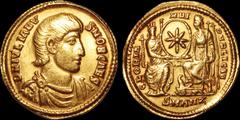 Roman Imperial ROMAN IMPERIAL. Julian II. As Caesar, A.D. 355-361. AV solidus. 4.36 gm. 21 mm. Antioch mint. His bare-headed, draped, and cuirassed bust right; DN IVLIANVS NOB CAES / Roma and Constant