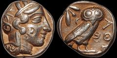 Greek EGYPT. Pharaonic Kingdom. Uncertain pharaoh(s). Late 5th-mid 4th centuries B.C. AR tetradrachm. 17.02 gm. 21 mm. Imitating Athens. Helmeted head of Athena right with frontal eye; c/m: uncertain 