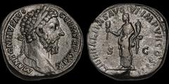 Marcus Aurelius. A.D. 161-180. Æ sestertius. 27.22 gm. 30 mm. Rome mint. Struck A.D. 175. His laureate head right; M ANTONINVS AVG GERM TR P XXIX / Liberalitas standing left, holding abacus (coin-coun