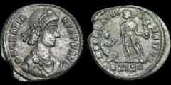 Gratian. A.D. 367-383. Æ 2. 5.21 gm. 24 mm. Siscia mint. Struck A.D. 378-383. His pearl-diademed, draped, and cuirassed bust right; D N GRATIANVS P F AVG / Emperor standing facing, head left, raising 