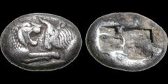 Greek Kings of Lydia. Archaic period. Time of King Croesus or later (Cyrus). Ca 561-545 B.C. AR siglos. 5.20 gm. 16 mm. A lion coming from the left confronting a bull (foreparts only) / Two incuse squ