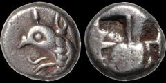 Greek IONIA. Phokaia. Circa 521-478 B.C. AR diobol. 1.57 gm. 10 mm. Griffin head left with protruding tongue / Irregular quadripartite incuse square. SNG Keckman 300. SNG von Aulock 2116. Very Fine.