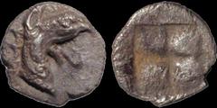 Greek IONIA. Teos. Circa 520-478 B.C. AR tetartemorion. .23 gm. 6 mm. Head of a griffin right / Four part incuse square. Rosen 603. Good Very Fine; light porosity; good style. Rare.