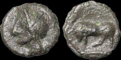 Celtic Britain CELTIC BRITAIN. KENT. Cantiaci. Ã† potin unit, cast (Thurrock). 2.10 gm. 15 mm. Class I. Stylized head of Apollo left / Realistic bull butting left. VA 1404. ABC 120 var. S. 62 var. Ver