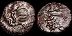 Celtic Britain CELTIC BRITAIN. Armorica (Channel Islands and NW Gaul). Circa 75-50 B.C. Base billon, quarter stater. 1.34 gm. 15 mm. Stylized head right with almond shaped eye / Horse leaping right; b