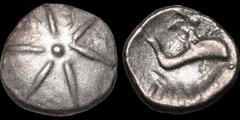 Celtic Britain CELTIC BRITAIN. Southern: Regini and Atrebates. Tincomarus. Circa 25 B.C - A.D. 10. AR unit. 1.22 gm. 11 mm. A shining star, six rays emanating from a central pellet / A boy on a dolphi
