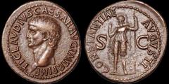 Roman Imperial Claudius. A.D. 41-54. Æ as. 10.7 gm. 30 mm. Rome mint. Struck circa A.D. 41-50. His bare head left; TI CLAVDIVS CAESAR AVG P M TR P IMP / Constantia standing left, helmeted and in milit