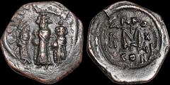 Byzantine BYZANTINE EMPIRE. Heraclius, with Martina and Heraclius Constantine. 610-641. Æ follis. 6.45 gm. 25 mm. Constantinople mint, 3rd officina. Dated regnal year 17 (626/7). Heraclius (center), H