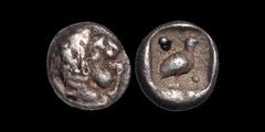Greek CARIA. Mylasa(?). Circa 420-390 B.C. AR tetartemorion. .29 gm. 6 mm. Head of lion right / Bird right within incuse square, pellet in top left and bottom right corners. SNG Keckman 922. SNG Kayha