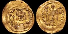 Byzantine BYZANTINE EMPIRE. Maurice Tiberius. 582-602. AV solidus. 4.47 gm. 21 mm. Constantinople mint, 4th officina. His draped and cuirassed bust facing, wearing plumed helmet and holding globus cru