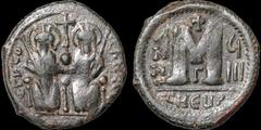 Byzantine BYZANTINE EMPIRE. Justin II, with Sophia. 565-578. Æ follis. 10.71 gm. 27 mm. Theoupolis (Antioch) mint, 3rd officina. Dated RY 8 (572/573). Justin and Sophia seated facing on double throne,