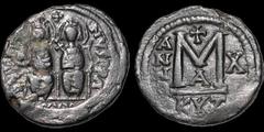 Byzantine BYZANTINE EMPIRE. Justin II, with Sophia. 565-578. Æ follis. 15.74 gm. 30 mm. Cyzicus mint, 1st officina. Dated RY 10 (574/575). Justin holding globus cruciger and Sophia holding cross-tippe