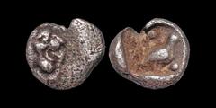 Greek CARIA. Mylasa(?). Circa 420-390 B.C. AR tetartemorion. .22 gm. 6 mm. Head of lion right / Bird right within incuse square, pellet in top left and bottom right corners. SNG Keckman 922. SNG Kayha