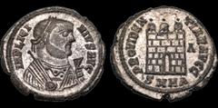 Roman Imperial Licinius I. A.D. 308-324. Billon follis. 2.84 gm. 20 mm. Heraclea mint, 1st officina. Struck A.D. 318-320. His laureate and draped bust right, holding mappa, globe, and scepter; IMP LIC