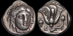 Greek ISLANDS OFF CARIA. Rhodos. Rhodes. Circa 340-316 B.C. AR didrachm. 6.81 gm. 19 mm. Head of Helios facing slightly right / Rose with bud to right; [ΡΟ]ΔΙΟ[Ν] above, grape bunch and E to left; all