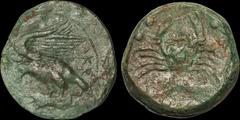 Greek SICILY. Akragas. Circa 415-406 B.C. Æ hemilitron. 14 gm. 26 mm. Eagle with head lowered and wings raised standing left, tearing at hare in talons; AKPA / Crab; crayfish below, six pellets around