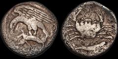 Greek SICILY. Akragas. Circa 420-410 B.C. AR hemidrachm. 1.85 gm. 16 mm. Eagle standing left on, and tearing at, hare in talons / Crab; below, fish right. HGC 2, 103-104. Westermark, Coinage, 545. SNG