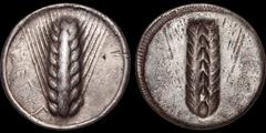 Greek LUCANIA. Metapontion. Circa 540-510 B.C. AR nomos. 6.7 gm. 27 mm. Ear of barley with eight grains; METAΠ downwards to left / Incuse ear of barley with seven grains in the center, eight grains on