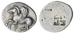 The Robert P Ball Cabinet of Ancient Coins | Corinthia, Corinth, AR Stater, c. 550-500 BC, Pegasus flying left, koppa below, rev. quadripartite incuse square and swastika pattern (BCD Corinth 3; Rosen
