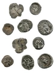 ANCIENT COINS Quintet of uncertain Greek AR Fractions. Ca. 5th-4th Century BC. Lion head right. 0.25 gm; Facing bearded head/ Facing bearded bust. 0.18 gm; Roaring lion head right/ Bird standing left.