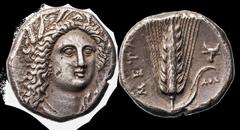 Magna Graecia Lucania. Metapontion. AR Stater, ca. 330-290 BC. 7.68 gms. Grain-ear wreathed head of Demeter ¾ right, wearing triple-pendant earring and necklace, rev. META, Barley of seven grains with