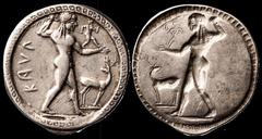 Magna Graecia Bruttium. Kaulonia. AR Stater, ca. 525-500 BC. 7.96 gms. KAVΛ, Apollo advancing right, holding branch, small daimon running right on his left forearm, stag standing right before, head re