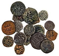 Islamic Coins Small Lot of Islamic AEs. 8th-14th Century. Falus (13) -- Umayyad, Abbasid (2), the rest generally Mamluk and Ayyubid. Syrian earthen patinas; a Khwarezmshah horseman Jital; also two Saf