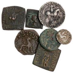 ANCIENT COINS Indo-Greek and Indo-Scythians. Lot. Baktria. Apollodotos I (180-160 BC). AE Unit, square, 10.7 gms. Apollo ¾ left/Tripod. Olive-brown, some tooling; Antialkidas (130-120 BC). AE Unit, sq