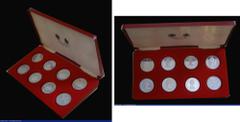 World Cased GB and World - Queen Elizabeth II Silver Jubilee 1977 an 8-coin set comprising Crown sized Silver Proof issues from GB, Guernsey, Jersey, Gibraltar, Tristan da Cunha, Mauritius, St. Helena