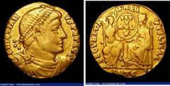 Ancient Coins Jovian. Au solidus. C, 363-364 AD. Antioch. Rev; SECVRITAS REIPVBLICAE; Roma seated facing and Constantinopolis seated left, holding between them a shield inscribed VOT / V / MVL / X. AN