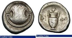 Roman and Ancient Coins Stater Ar. Thebes. Boeotia. C, 395-338 BC. Obv; Boeotian shield. Rev; Amphora, bunch of grapes above. SNG Cop 352. Slight porous surfaces. 11.69g. NVF