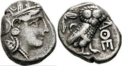 GRIECHISCHE MÜNZEN ATTIKA. Athen. (D) Tetradrachme (16,74 g), ca. 353-294 v. Chr. Av.: Kopf der Athena mit attischem Helm und Lorbeerkranz n.r. Rv.: AΘE, Eule n.r., Kopf v.v., dahinter Olivenzweig und