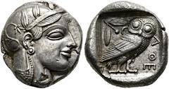 GRIECHISCHE MÜNZEN ATTIKA. Athen. Tetradrachme (17,12 g), ca. 465/460-449 v. Chr. Av.: Kopf der Athena mit attischem Helm und Lorbeerkranz n.r. Rv.: AΘE, Eule n.r., Kopf v.v., dahinter Olivenzweig und