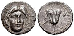 Greek Coins Rhodos. Tetradrachm. 304-190 BC. Magistrate; Tharsytas. (Ashton-215). (SNG von Aulock-2802). (Bmc-126). Anv.: Radiated head of Apollo Helios looking slightly to the right. Rev.: Rose with 