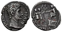 Roman Imperatorial Augustus. Denarius. 15-13 BC. Lugdunum. (Ffc-106). (Ric-165a). (Cal-836). Anv.: AVGVSTVS DIVI. F. bare head of Augustus right. Rev.: IMP. X in exergue, two soldiers each presenting 