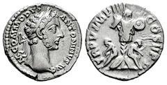 Roman Imperial Commodus. Denarius. 180 d.C. Rome. (Ric-III 9). (Bmcre-9). (Rsc-791). Anv.: M COMMODVS ANTONINVS AVG, laureate head to right. Rev.: TR P V IMP IIII COS II P P, trophy, captives seated t