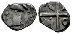 Greek Coins Southern Gaul. Volcae-Tectogases. Drachm. 2nd-1st century BC. (Depeyrot-NC II 72). Anv.: Male head left, two dolphins to left. Rev.: Long cross with three ornaments and one ax in quarters.