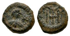 Visigothic Coins Nummus. Second half of the 7th century. Emérita (Mérida). (Crusafont-Group D, type 44). (Tesorillo-Visigodos 15, Plate Coin). Anv.: Bust on the right, in front of the cross and around