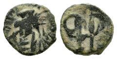 Visigothic Coins Nummus. Second half of the 7th century. Emérita (Mérida). (Crusafont-Group C, type 31). (Tesorillo-Visigodos 13, Plate Coin). Anv.: Radiate and draped bust to the left. Around it ther