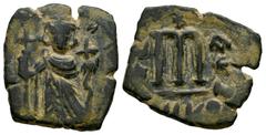 Islamic World Umayyad Caliphate. Imitating the types of Constans II. Fals. 640-650 AD. Uncertain mint. Arab-Byzantine type. (DOCAB-9/10). (Sear-1000). (Tesorillo-Cal. Omeya 1, Plate Coin). Ae. 4,42 g.