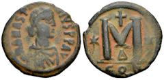 Byzantine Empire Anastasius I. Nummus. 498-507 AD. Constantinople. (Sear-19). Anv.: D N ANASTASIVS P P AVG, pearl-diademed, draped and cuirassed bust right. Rev.: Large M; cross above, star in left an