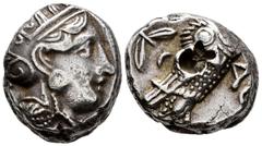 Greek Coins Attica. Athens. Tetradrachm. 350-294 BC. (Sng Cop-64). (Kroll-15). Anv.: Helmeted head of Athena right. Rev.: Owl standing right, head facing; olive sprig and crescent behind, ΑΘΕ before. 