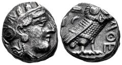 Greek Coins Attica. Athens. Tetradrachm. 350-294 BC. (Sng Cop-64). (Kroll-15). Anv.: Helmeted head of Athena right. Rev.: Owl standing right, head facing; olive sprig and crescent behind, ΑΘΕ before. 