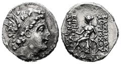 Greek Coins Seleukid Kingdom. Antioco VI. Drachm. 145-142 BC. Antioch. (Gc-7073). Anv.: Radiate and diademed head right. Rev.: Apollo Delphios seated left on omphalos; monogram between legs. Ag. 3,85 