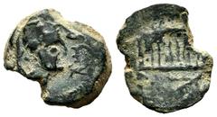 Celtiberian Coins Malaka. Cuadrante. 200-20 BC. Malaga. (Abh-1738). Anv.: Right Vulcan head, front Punic legend type B. Rev.: Tetrastyle temple. Ae. 3,69 g. Irregular edge. Scarce. VF/Choice F. Est...
