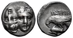 Greek Coins Moesia. Istros. Drachm. 256-240 BC. (SNG Stancomb-144). (SNG BM Black Sea-238). (Hgc-3.2). Anv.: Two young male heads facing inverted. Rev.: IΣTPIH above sea-eagle on dolphin left, A below